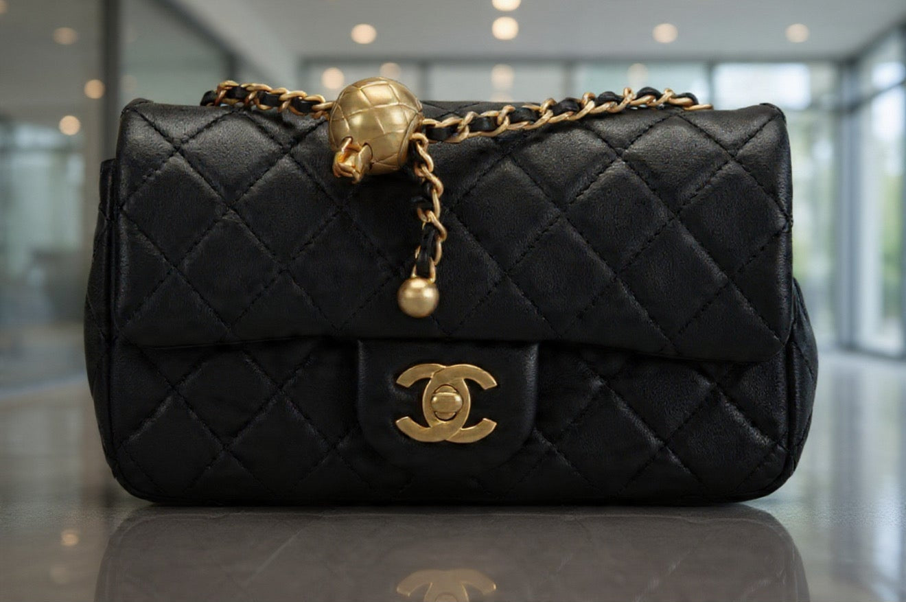 Chanel Classic Flap Bag – Black Quilted Lambskin with Gold Hardware