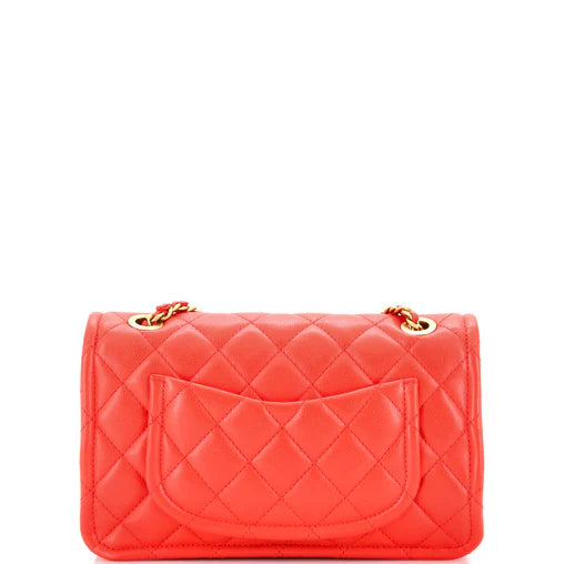Durable red quilted caviar leather texture on Chanel flap bag
