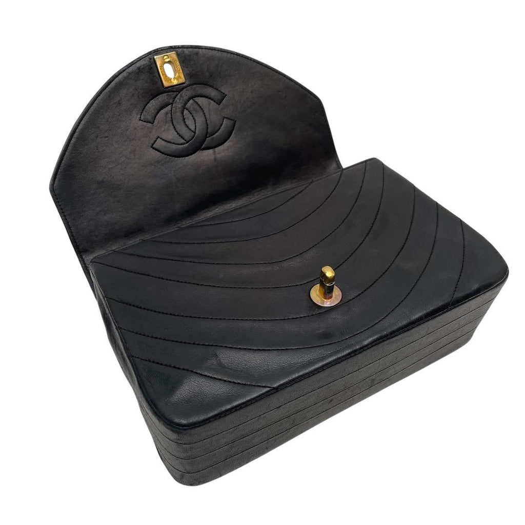 Chanel gold-tone Coco Mark turn-lock clasp detail