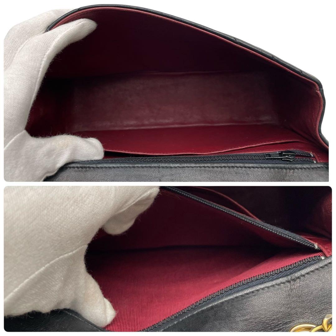 Clear interior of Vintage Chanel Double Chain Flap Bag Black Lambskin Gold Coco Mark - Saika Collective