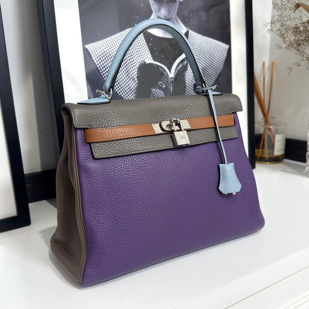 Side profile of multicolor Hermes Harlequin Kelly 32 showing leather panels